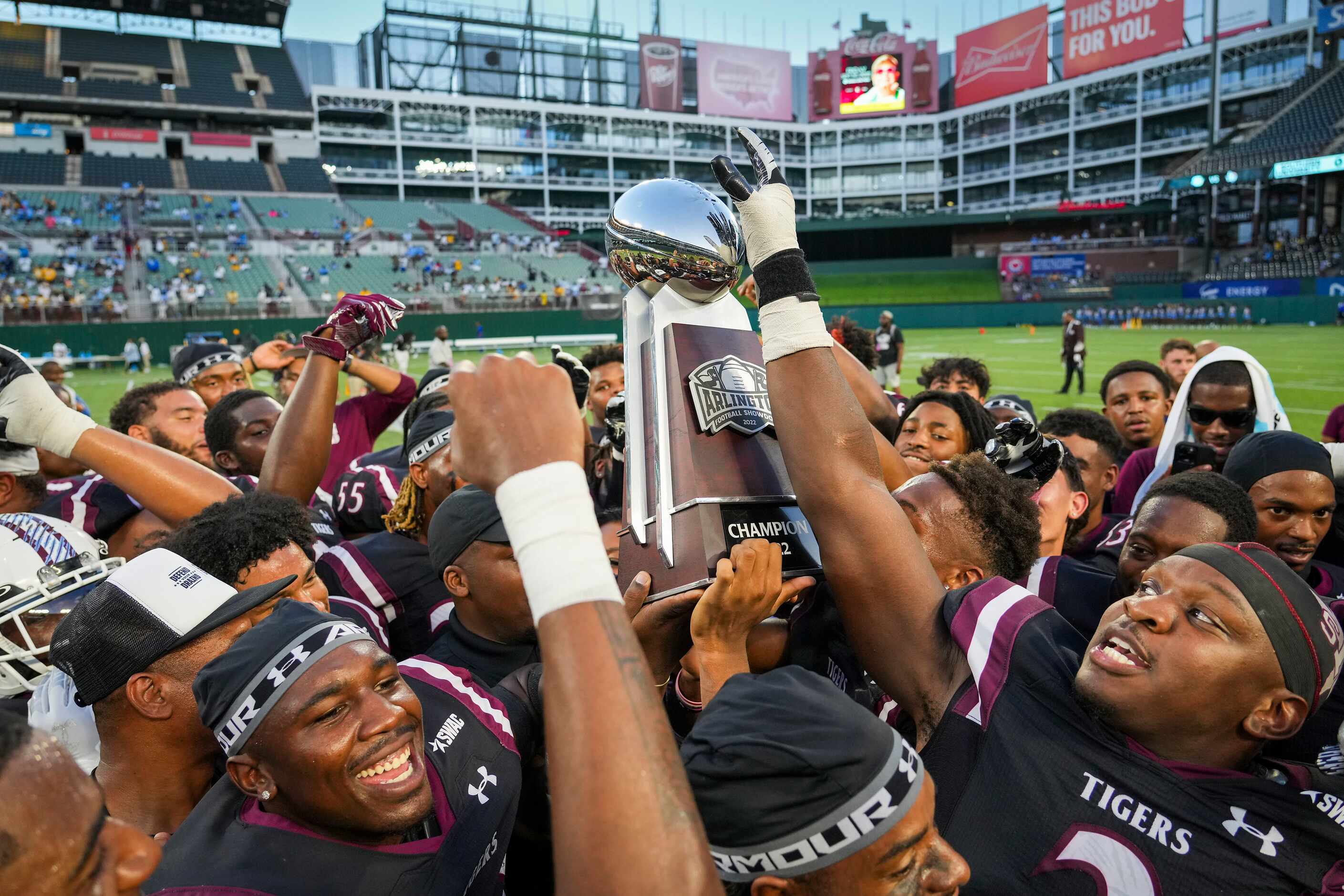 TSU payers celebrate with the Arlington Showdown trophy after a 24-0 victory over Southern...