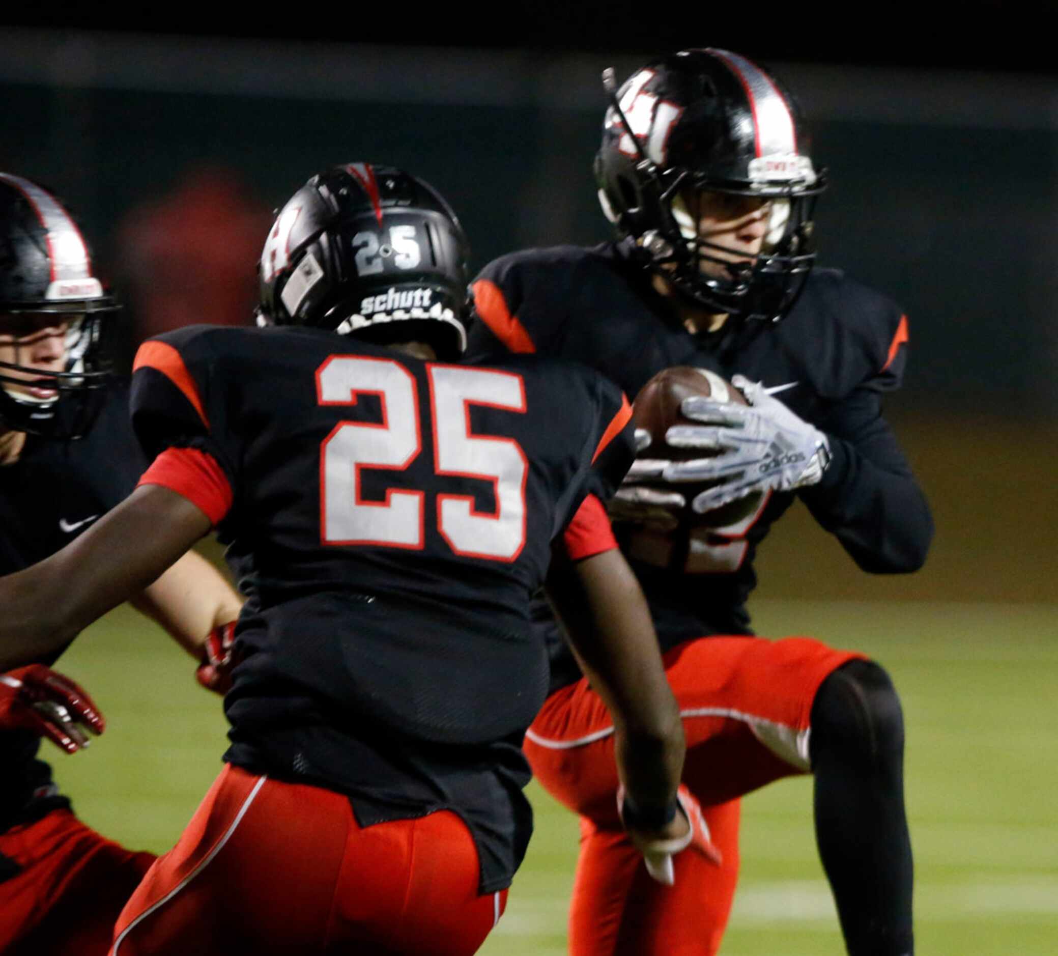 Lake Highlands defender Jacob Thomson (12) makes an interception for a touchdown during the...