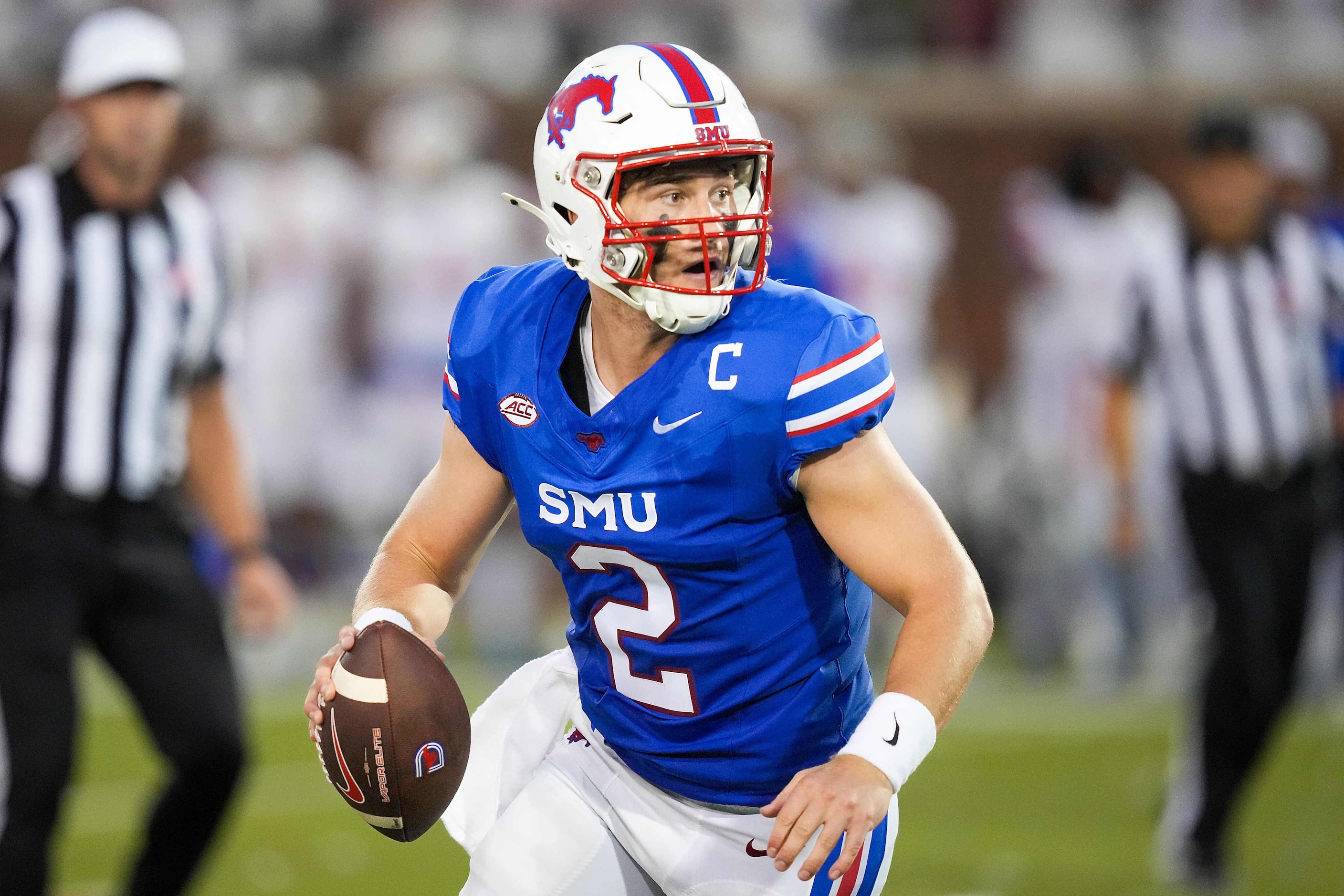 SMU quarterback Preston Stone (2) looks to pass during the first half of an NCAA football...