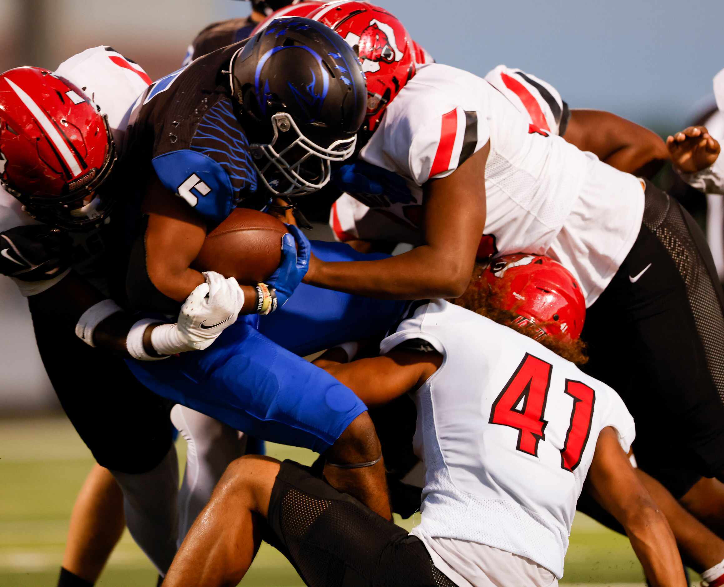 North Forney’s Damorrea Jones (5) is tacked by the Mesquite Horn’s defense during the first...