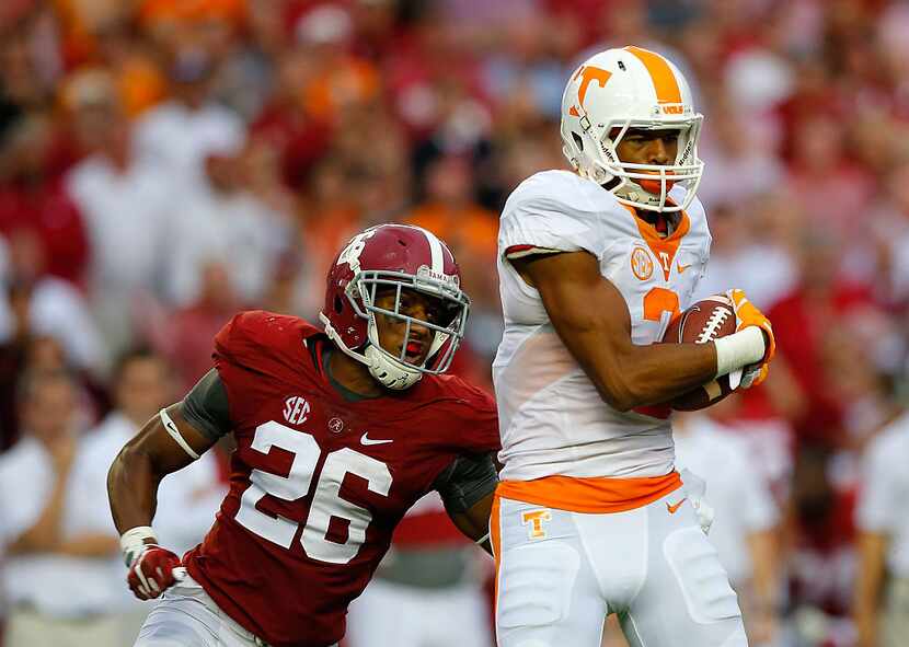 TUSCALOOSA, AL - OCTOBER 24:  Josh Malone #3 of the Tennessee Volunteers pulls in this...