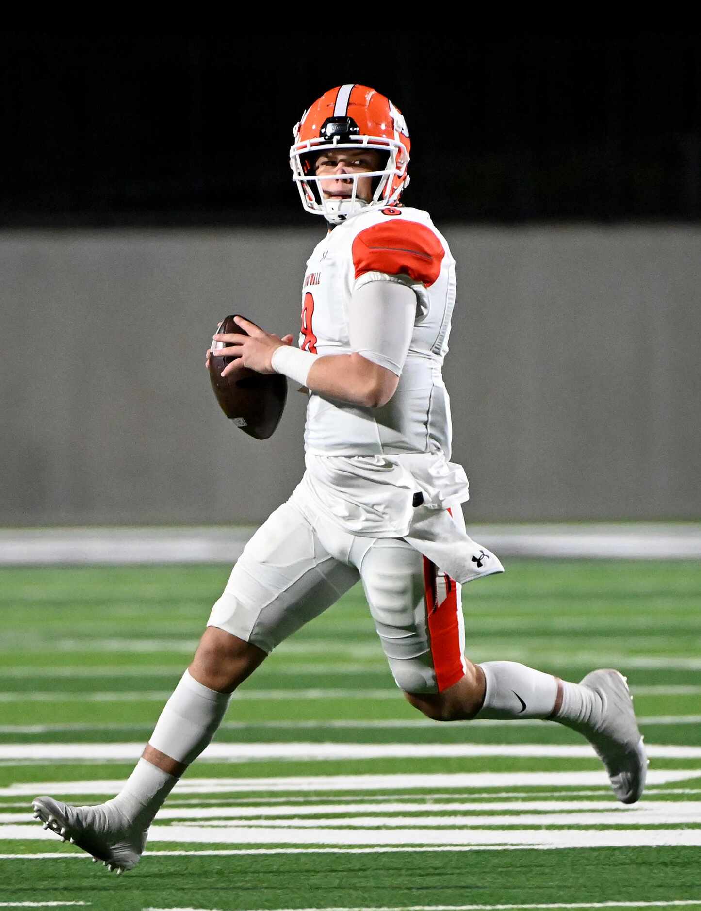 Rockwall quarterback Braedyn Locke looks to pass in the first half of a Class 6A Division I...