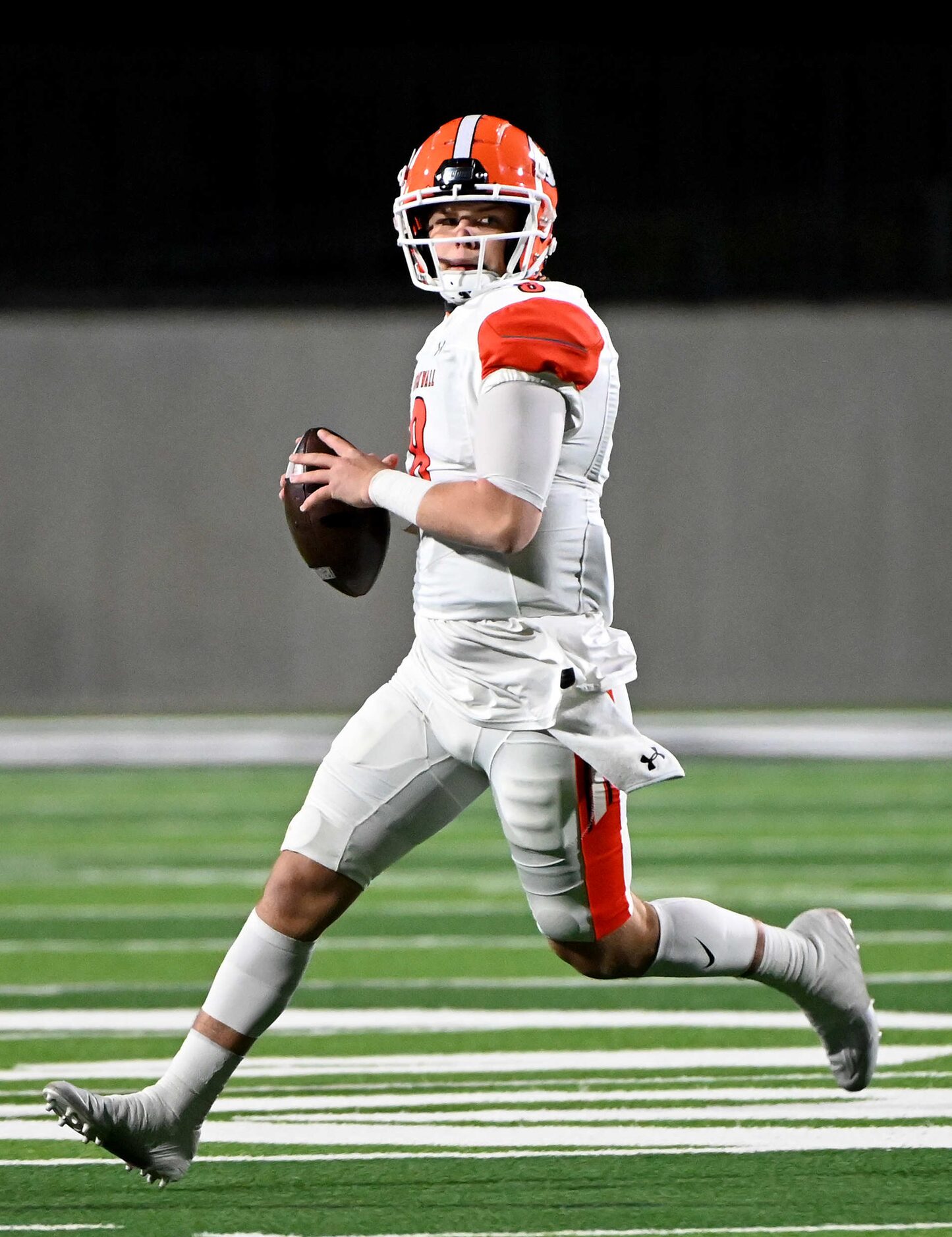 Rockwall quarterback Braedyn Locke looks to pass in the first half of a Class 6A Division I...