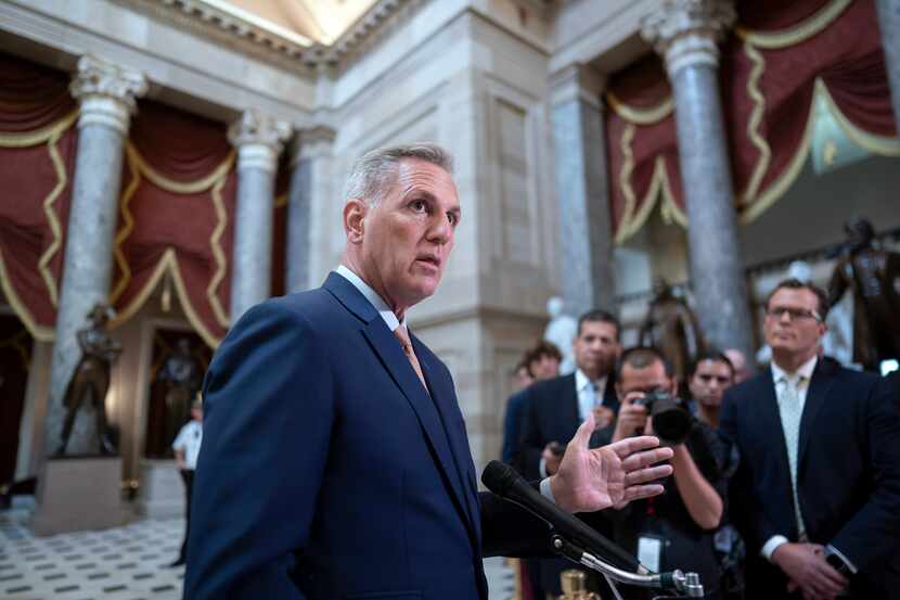 Speaker of the House Kevin McCarthy, R-Calif., talks to reporters at the Capitol in...