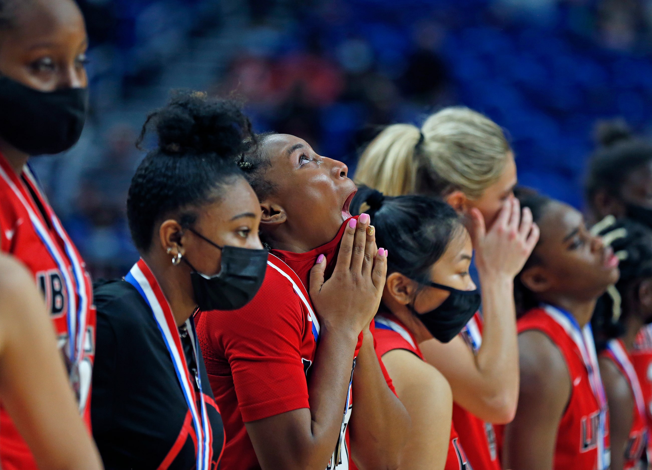 Frisco Liberty Jazzy Owens-Barnett #30 looks up and she and the rest of her teammates were...