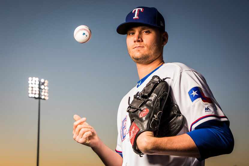 Texas Rangers pitcher Connor Sadzeck poses for a photo during Spring Training picture day at...
