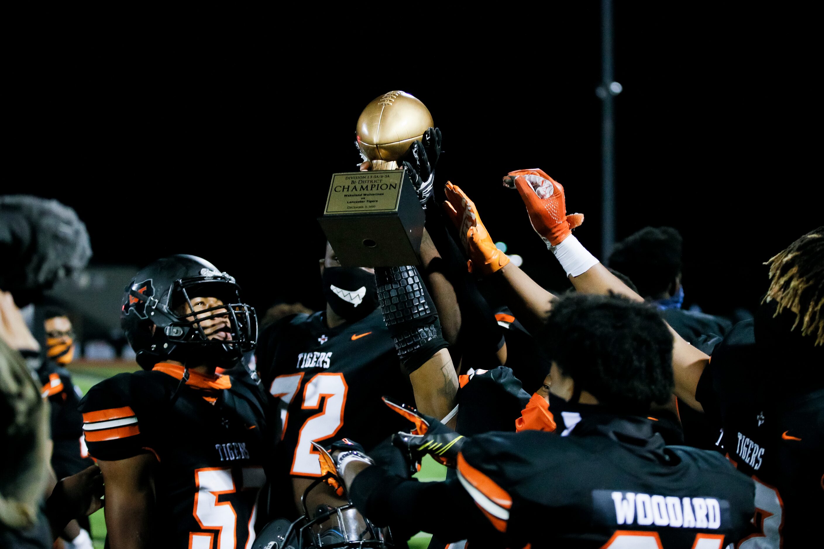 Lancaster celebrates a 29-6 win over Wakeland in a class 5A Division I bi-district round...