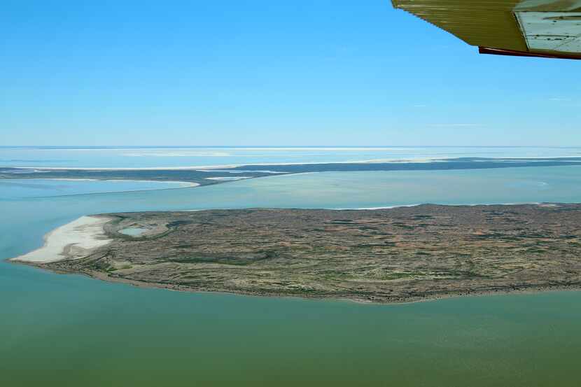 Flying over Kati Thanda-Lake Eyre is a once-in-a-lifetime treat. See it in flood, and you'll...