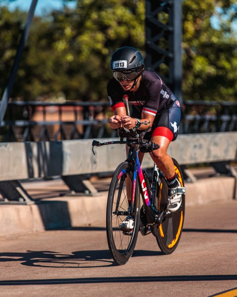 Brandi Grissom Swicegood cycles toward the finish of the Ironman 70.3 Waco bike leg on Oct....