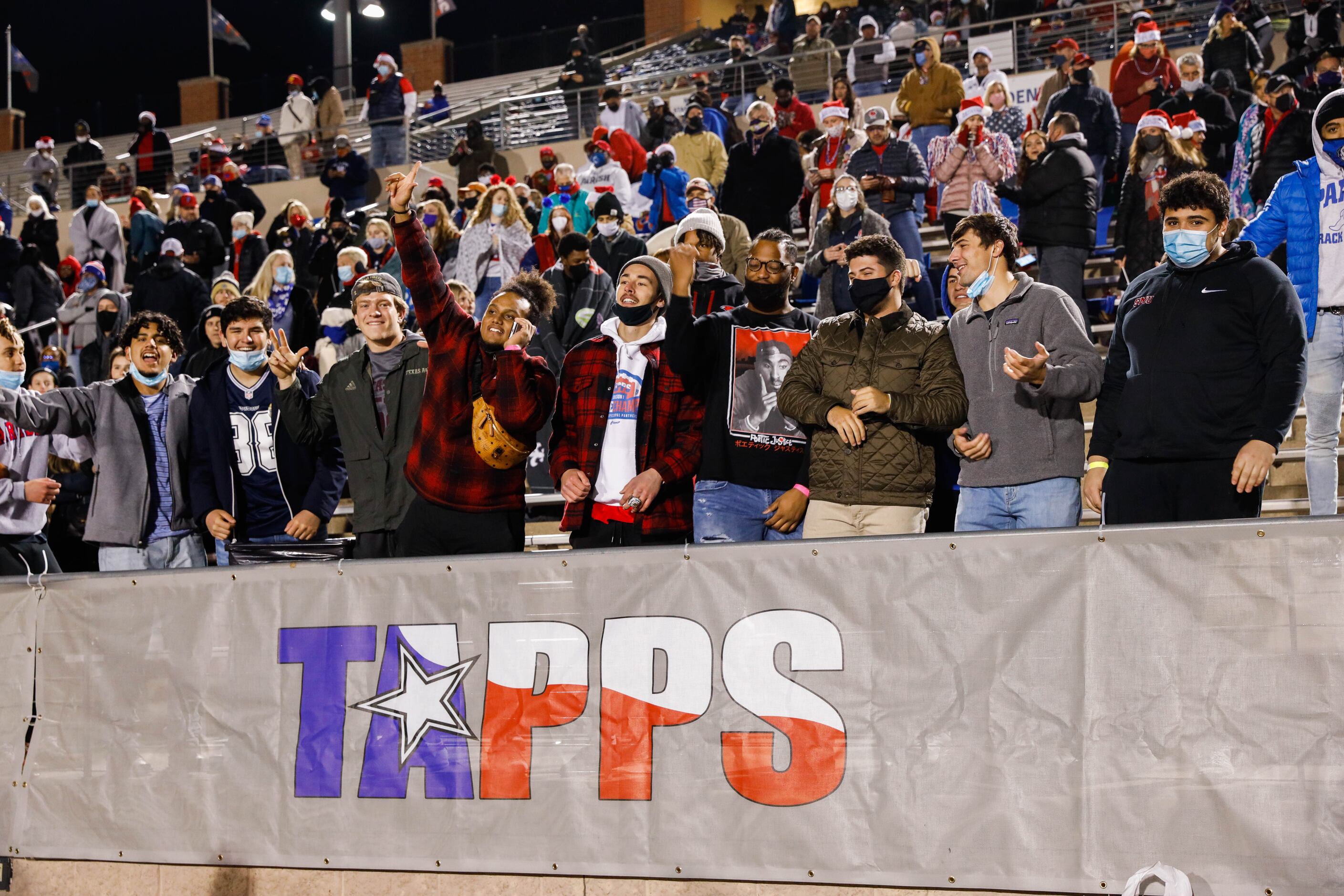 Parish Episcopal's fans celebrate a play during the fourth quarter of a TAPPS Division I...