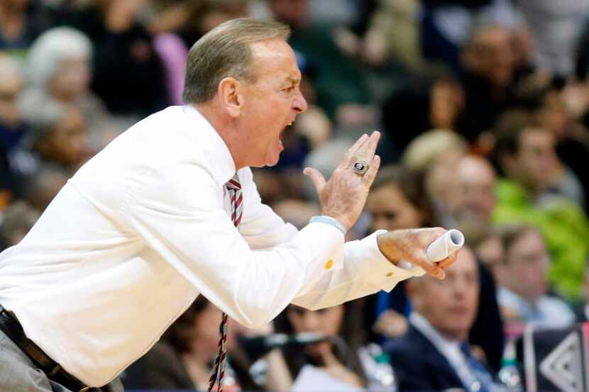 Mississippi State Lady Bulldogs head coach Vic Schaefer tries to fire up his players as they...