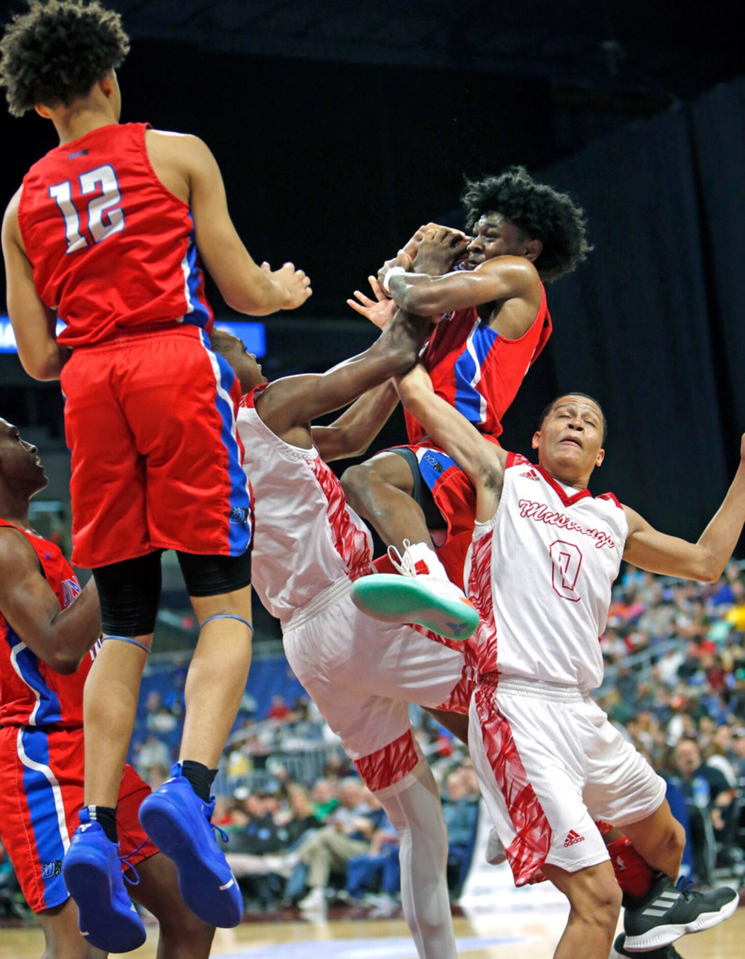 Duncanville's Ja'Bryant Hill #2 grabs a rebound over Galena Park North's Joshua Cooper #0....