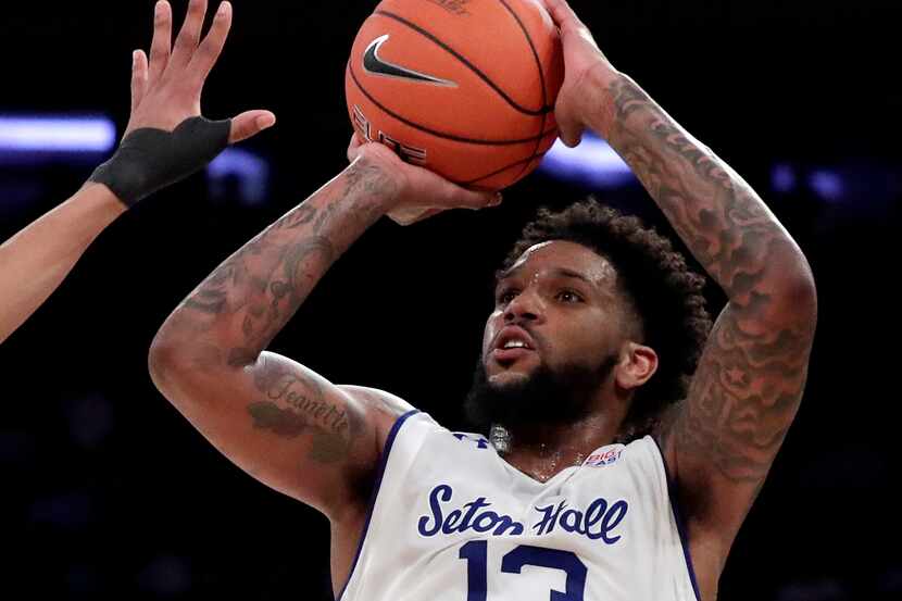 FILE - In this March 14, 2019, file photo, Seton Hall guard Myles Powell (13) shoots against...
