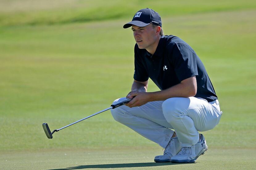 Jordan Spieth lines up a putt on the 18th green during round 2 of AT&T Byron Nelson at...