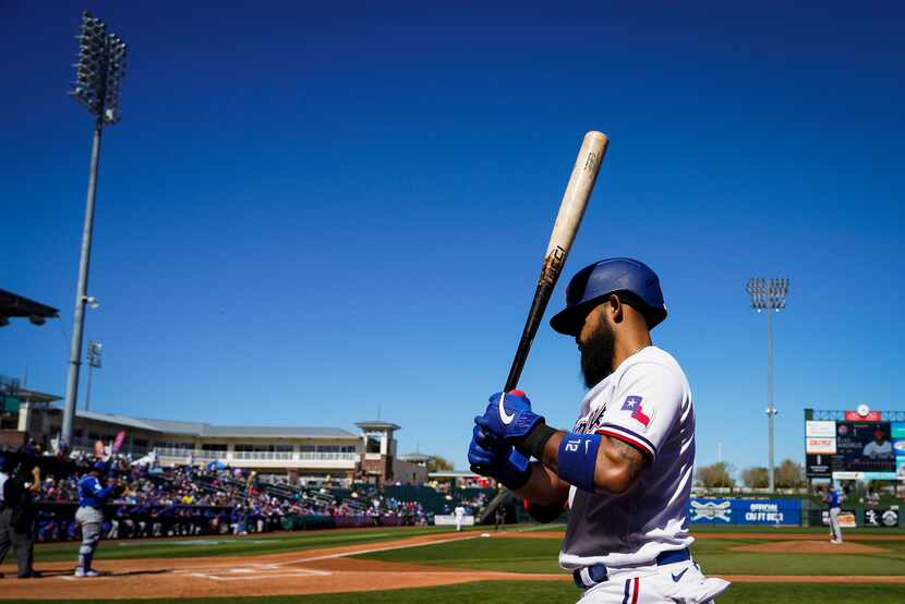 Texas Rangers second baseman Rougned Odor waits on deck during the second inning of a spring...