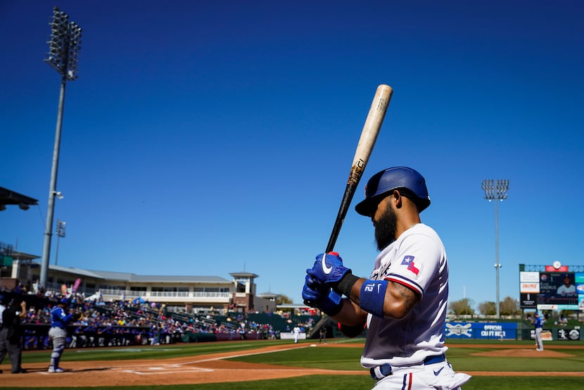 Texas Rangers second baseman Rougned Odor waits on deck during the second inning of a spring...