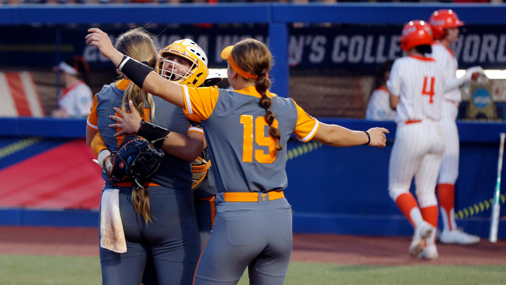 From left, Tennessee's Ashley Rogers, Giulia Koutsoyanopulos, and Jamison Brockenbrough (19)...