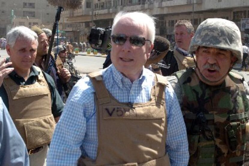 A picture released by the U.S. military April 3, 2007, shows U.S. Sen. John McCain visiting...