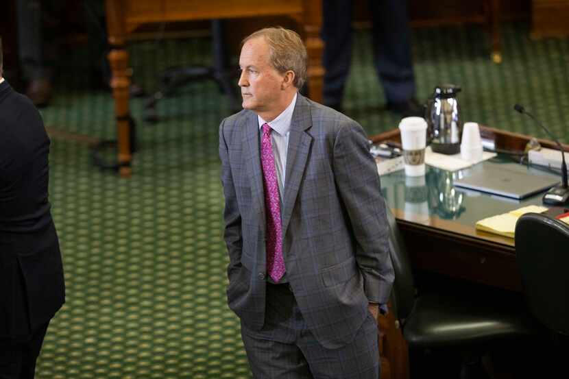 Texas Attorney General Ken Paxton on the Senate floor after the Senate was adjourned for...