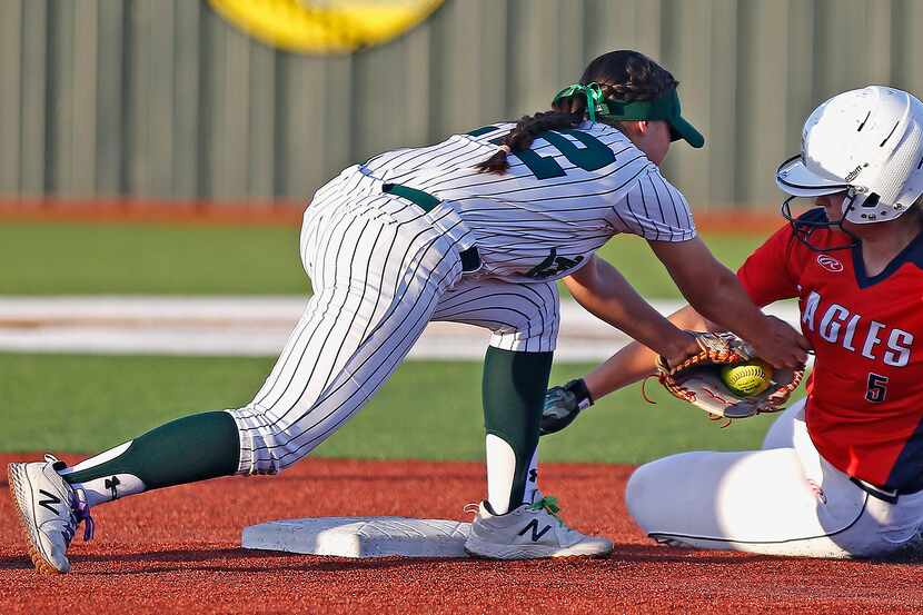 Allen's Brooklyn Purtell (5) is tagged out at second base by Prosper's Ezra Arredondo (22)...