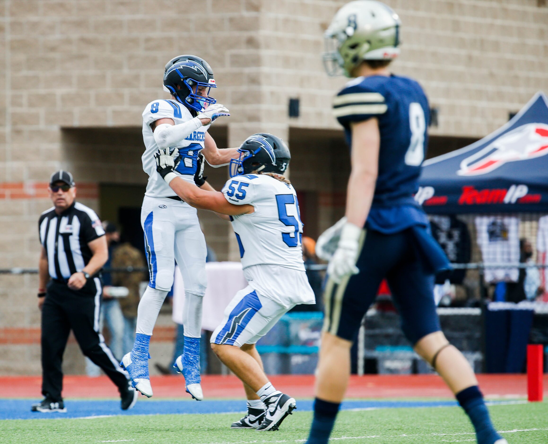 Dallas Christian's Parker Robertson (8) celebrates his touchdown against Austin Regents with...