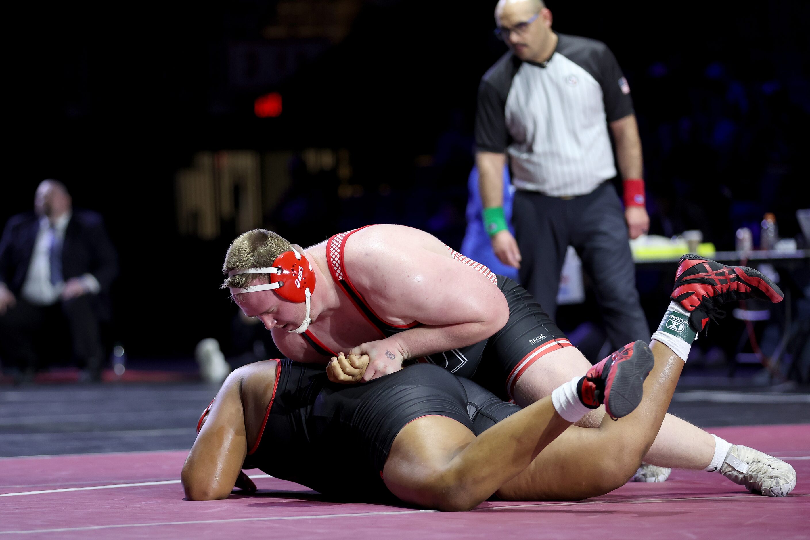 Sam Reynolds of Lovejoy (red) competes against Cameron Lewis of Rosenberg Terry in the Boys...