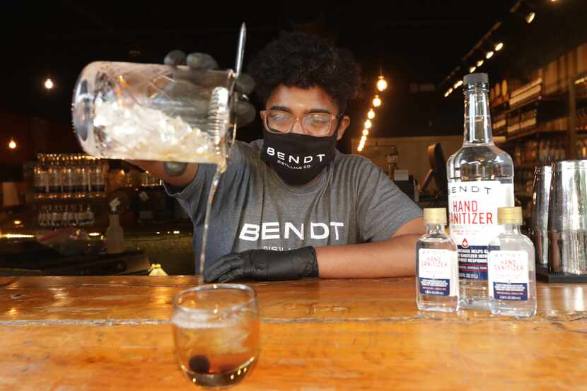 Bartender Michael Moore makes an old fashioned at Bendt Distilling in Lewisville, TX, on...