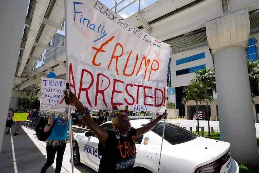 People rally at Miami federal courthouse on June 13, 2023, ahead of former President Donald...