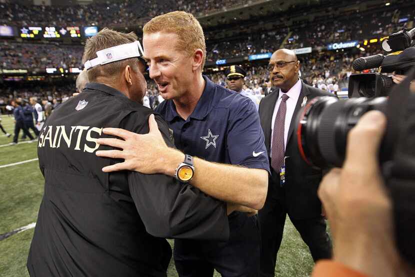 Dallas Cowboys head coach Jason Garrett and New Orleans Saints head coach Sean Payton meet...