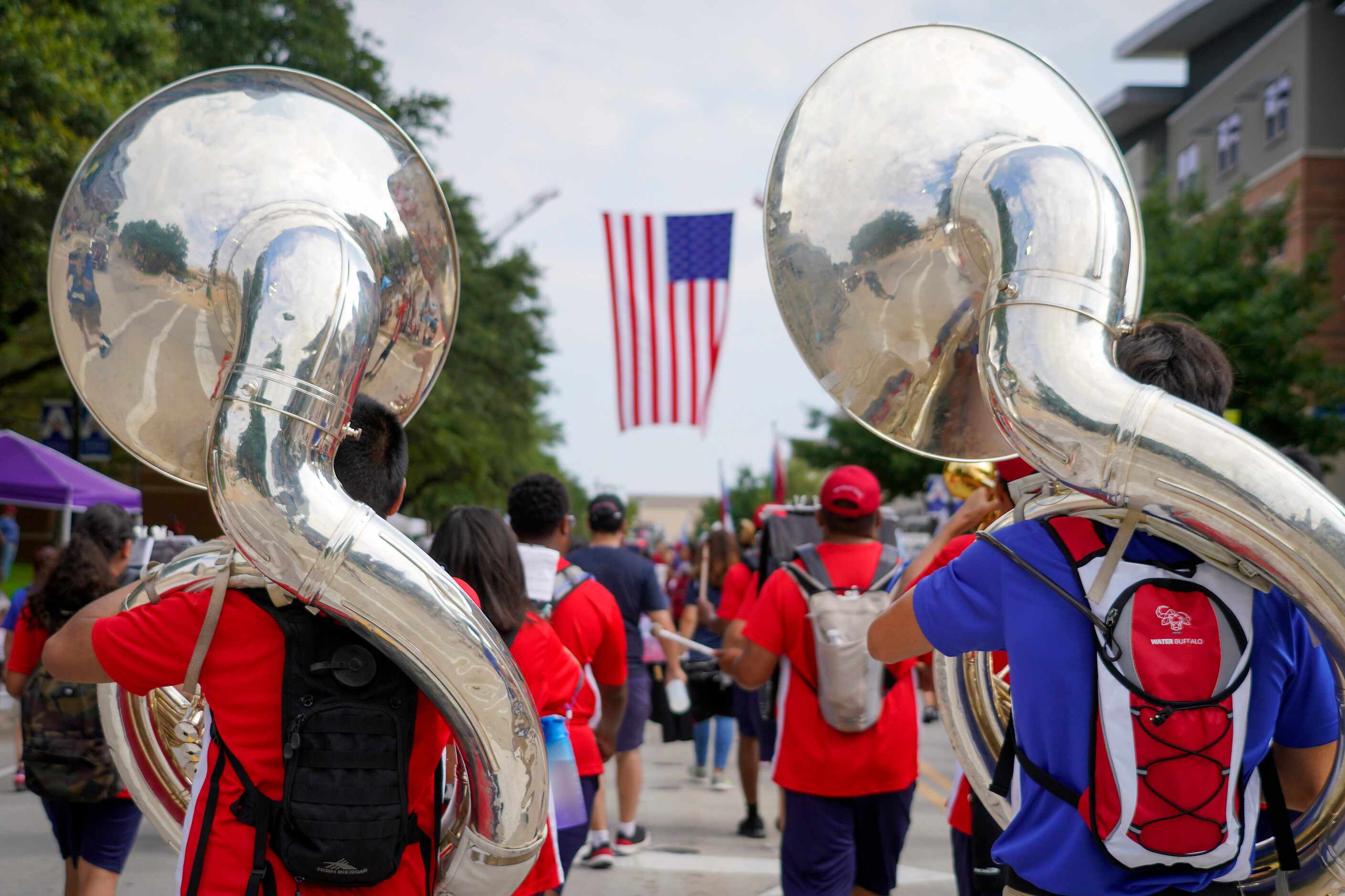 Members of the Arlington Sam Houston High School band march in the Arlington Independence...