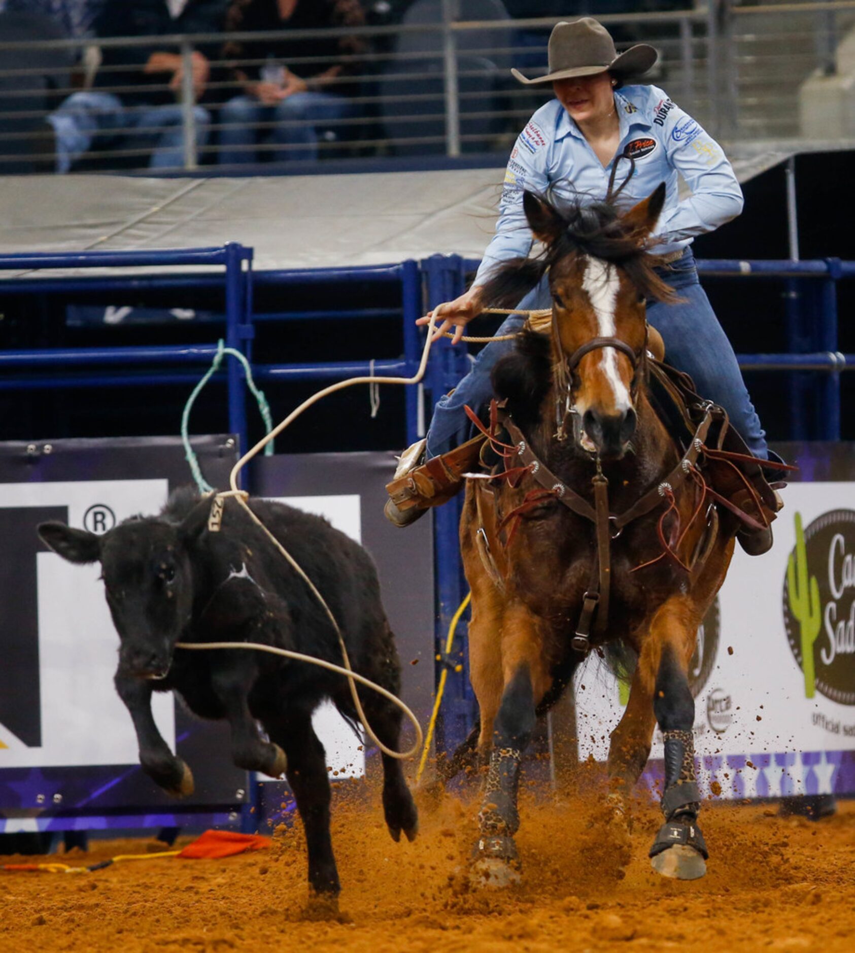 Breakaway roper Kaycee Hollingback competes in RFD-TV's The American rodeo at AT&T Stadium...