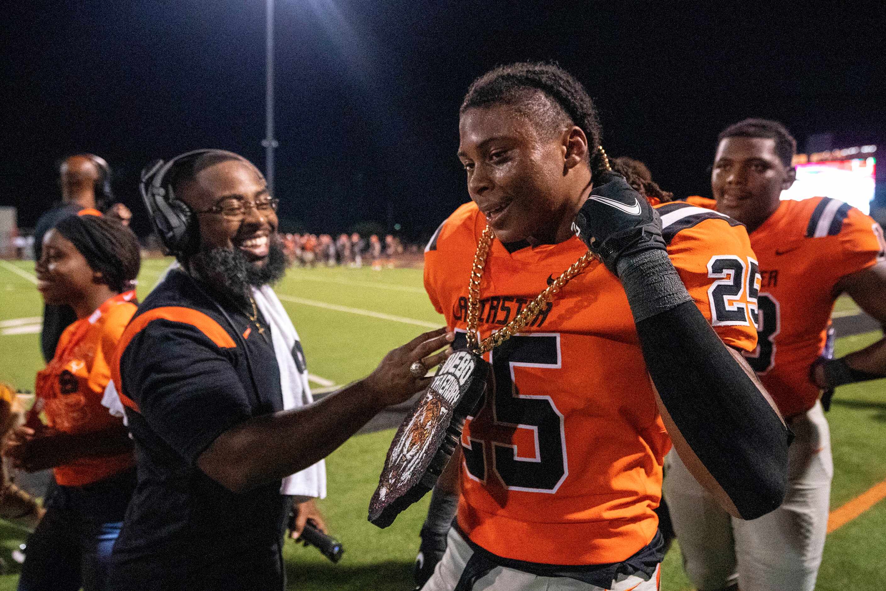 Lancaster senior defensive back Gerald Lacy (25) celebrates on the sidelines after making an...