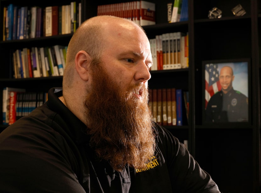 Dallas police dispatcher Owen Larsen speaks to The Dallas Morning News at Jack Evans Police...