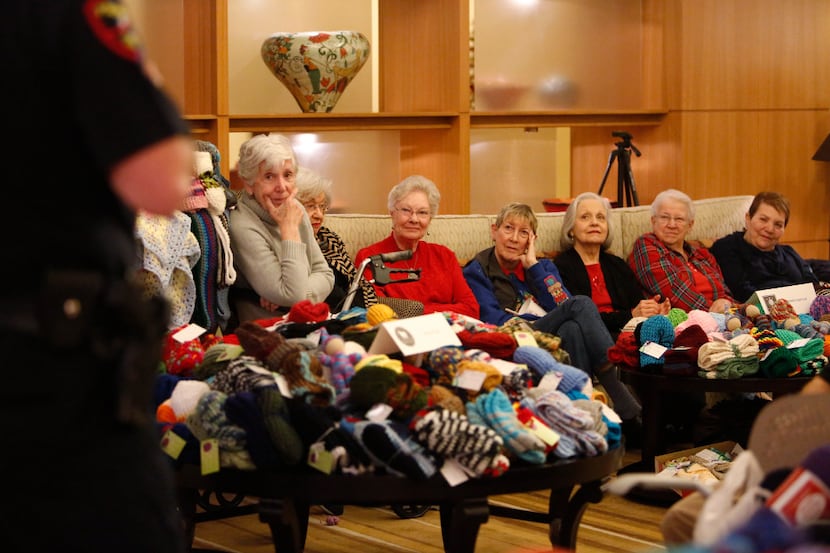 Members of the knitting group at The Legacy Willow Bend retirement community gathered in...