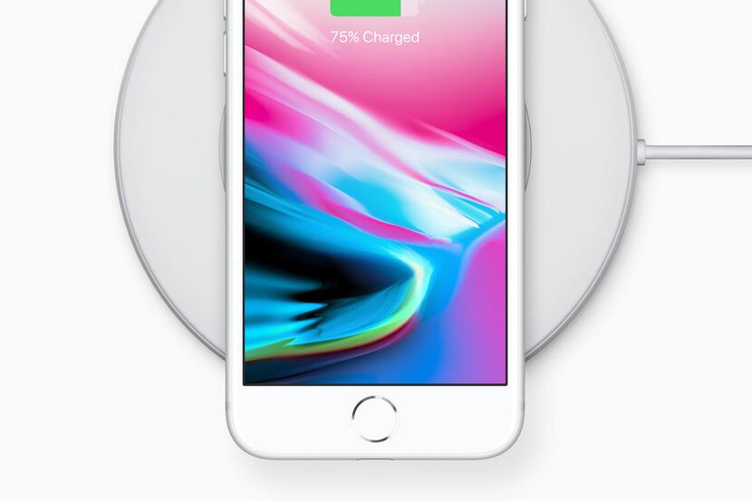 iPhone 8 on wireless charging pad.