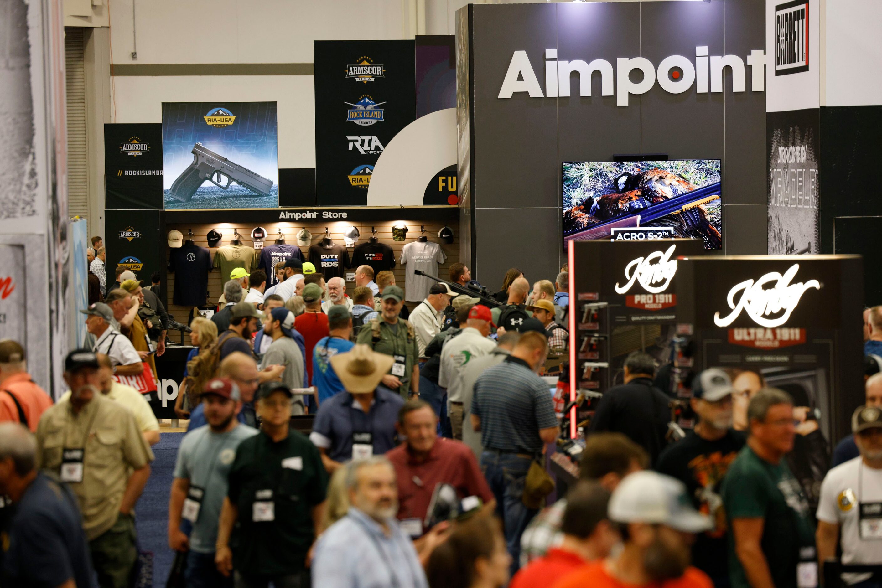 Visitors walk around during 2024 NRA Annual Meetings & Exhibits at Kay Bailey Hutchison...