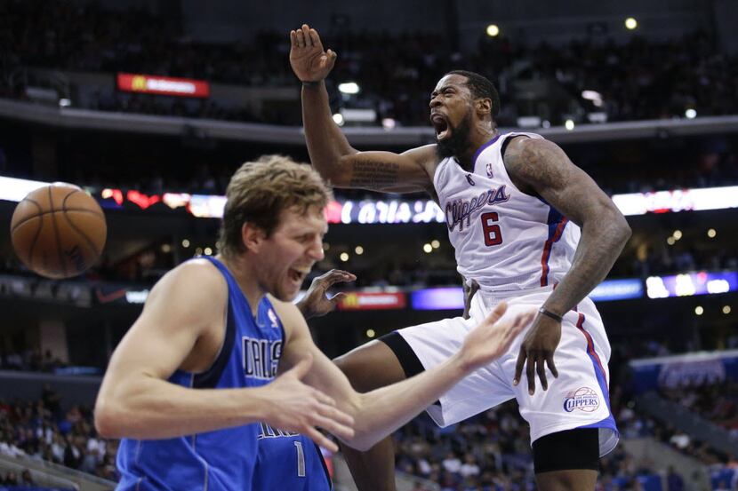 FILE - In this April 3, 2014, file photo, Los Angeles Clippers' DeAndre Jordan, right,...