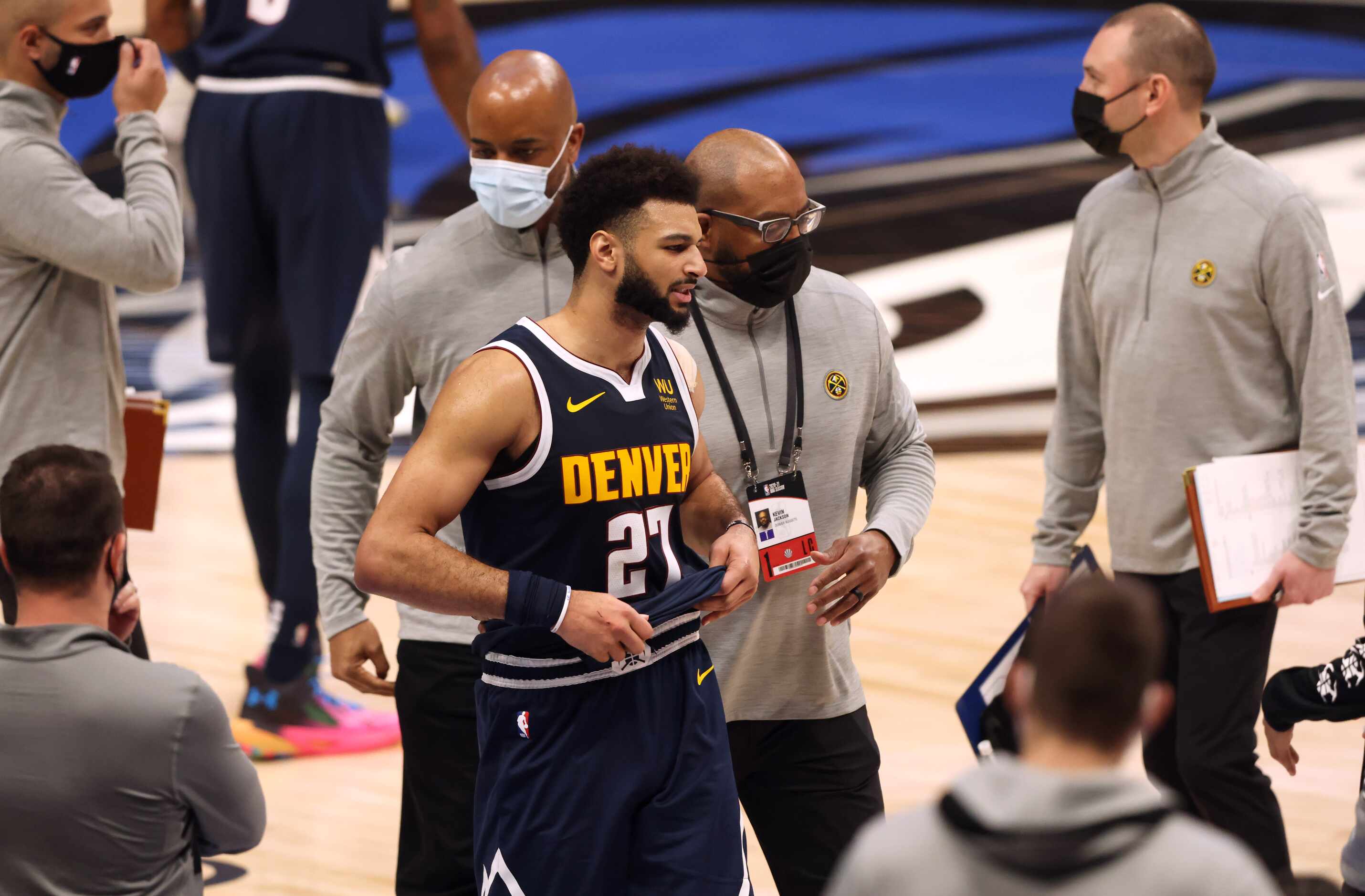 Denver Nuggets guard Jamal Murray (27) is escorted off the court after getting ejected in a...