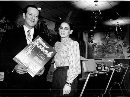 "Chris and Anastasia Semos stand in their soon-to-be-closed restaurant." Published in the...