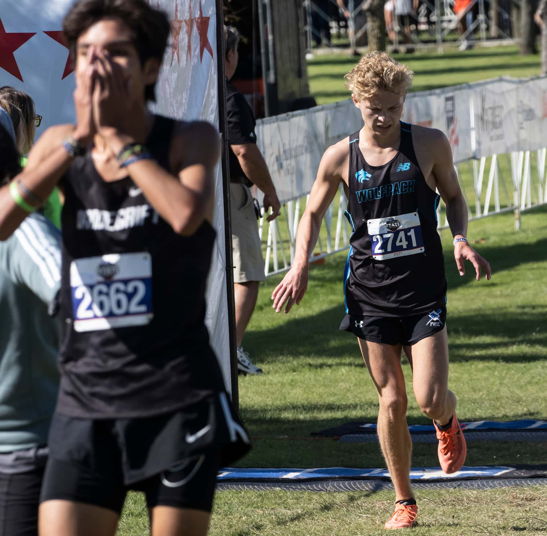 Plano West Hudson Heikkinen, (2741), crosses the finish line in second behind, Austin...