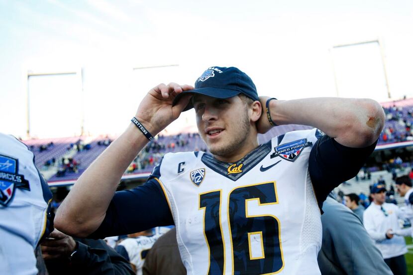 California Golden Bears quarterback Jared Goff (16) puts on a Lockheed Martin Armed Forces...
