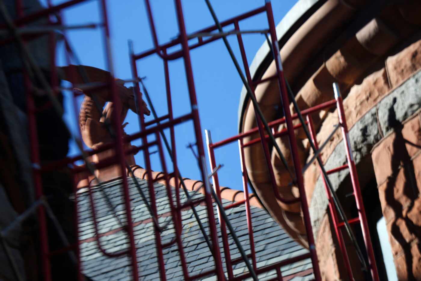 A wyvern statue sits atop the Old Red Courthouse, which will be covered in scaffolding for...