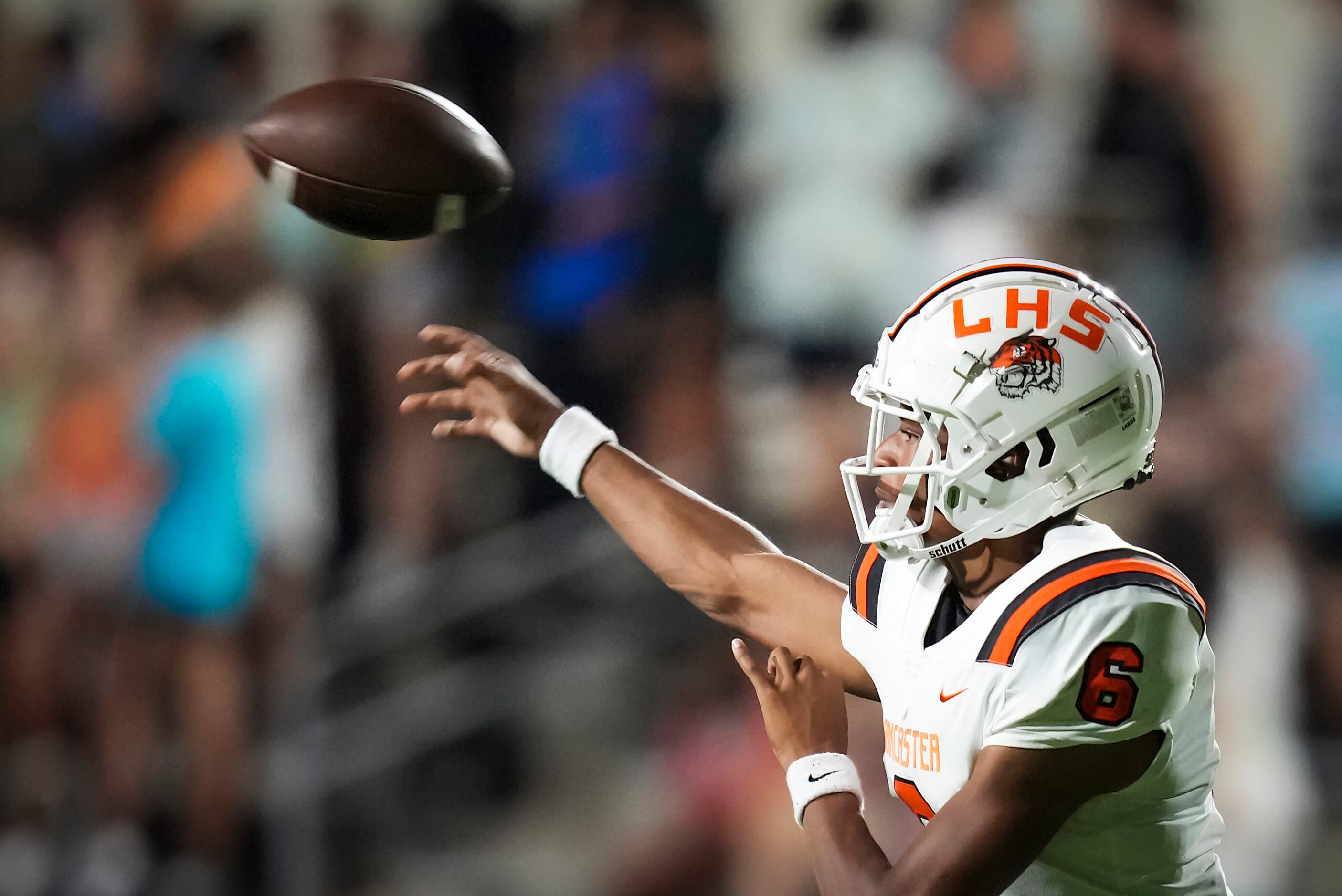 Lancaster quarterback Carter Jones  (6) throws a pass during the second half of a high...