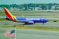 Southwest Airlines and Delta Airlines aircraft taxi at Boston Logan Airport on Tuesday, June...