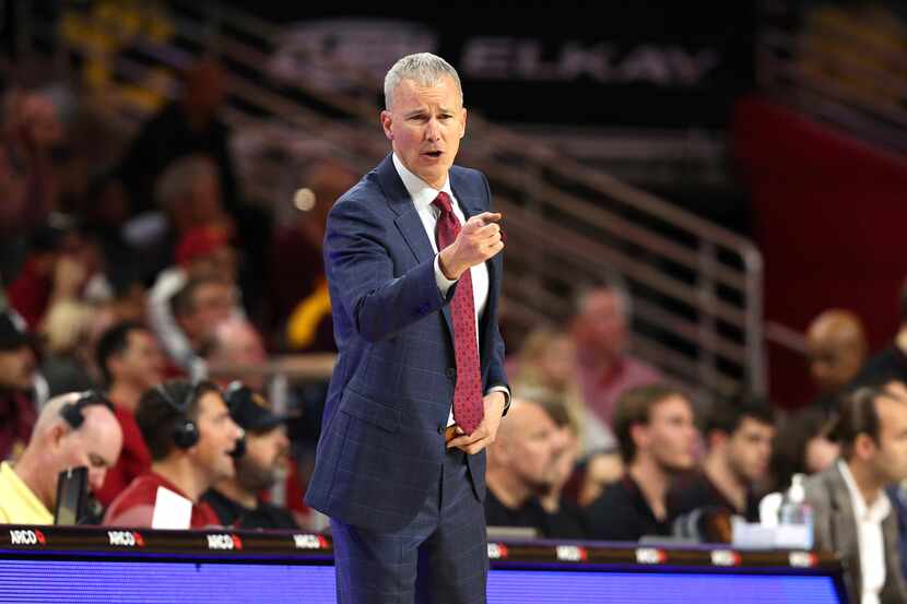 FILE - Southern California head coach Andy Enfield reacts during the second half of an NCAA...