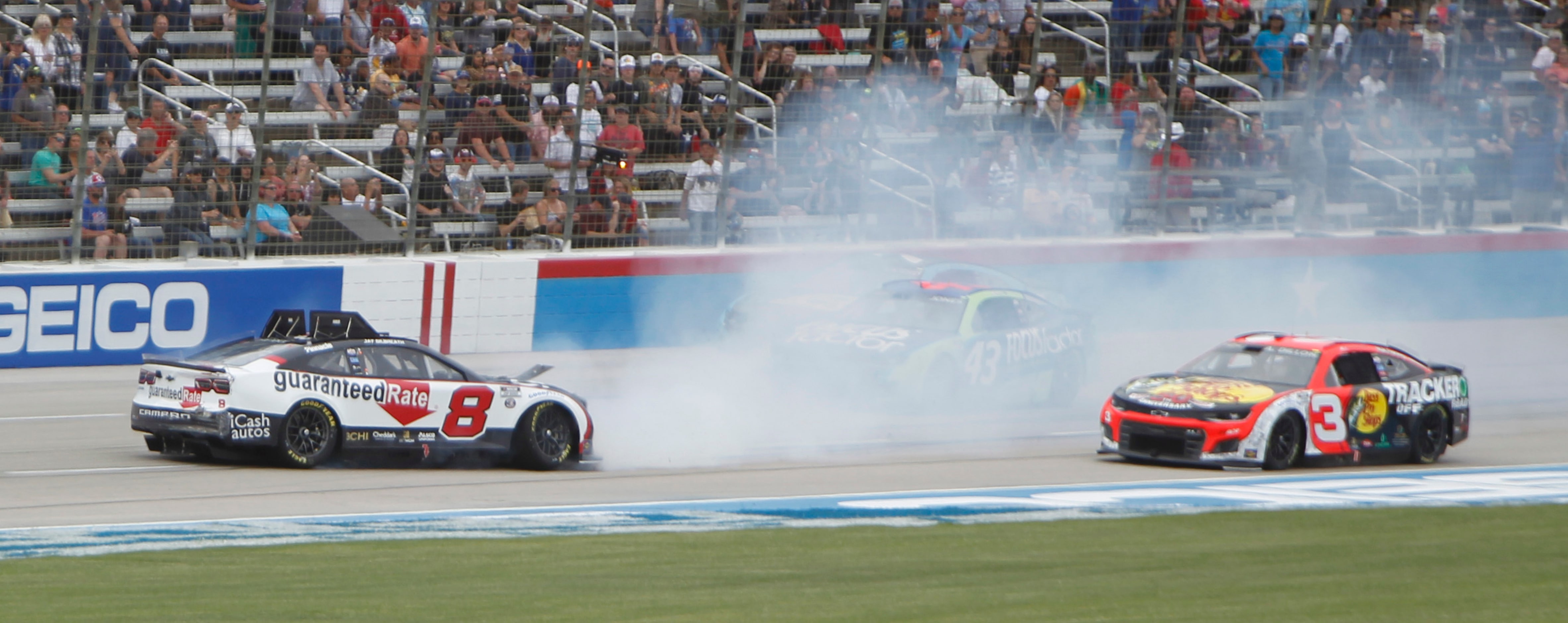 Driver Austin Dillon, right, in the #3 Bass Pro Shops Tracker Off Road Chevrolet car...