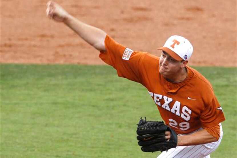 Texas' Corey Knebel pitches against Missouri in the second inning of a Big 12 conference...