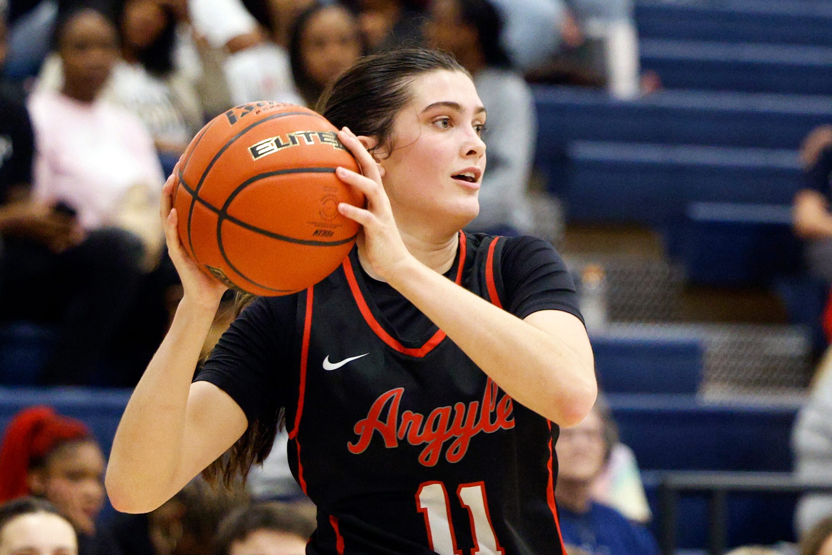 Argyle forward Samantha Bacon (11) pump fakes as she looks to pass during the second half of...