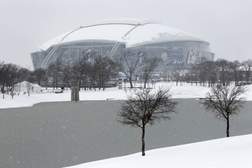 FILE — The parkS around Mark Holtz Lake and Cowboys Stadium, site of Super Bowl XLV, were...