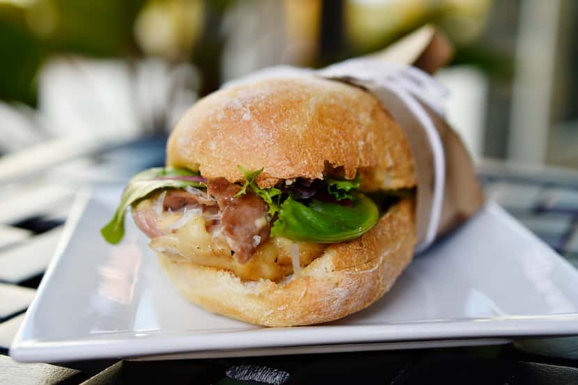 La Reunion's pressed chicken sandwich is simple and popular.